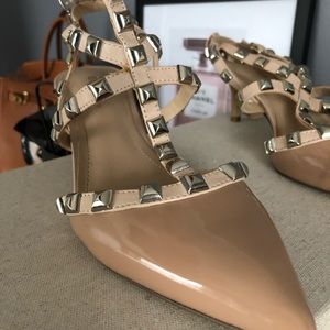 Women’s size 8.5 BCBG pumps.